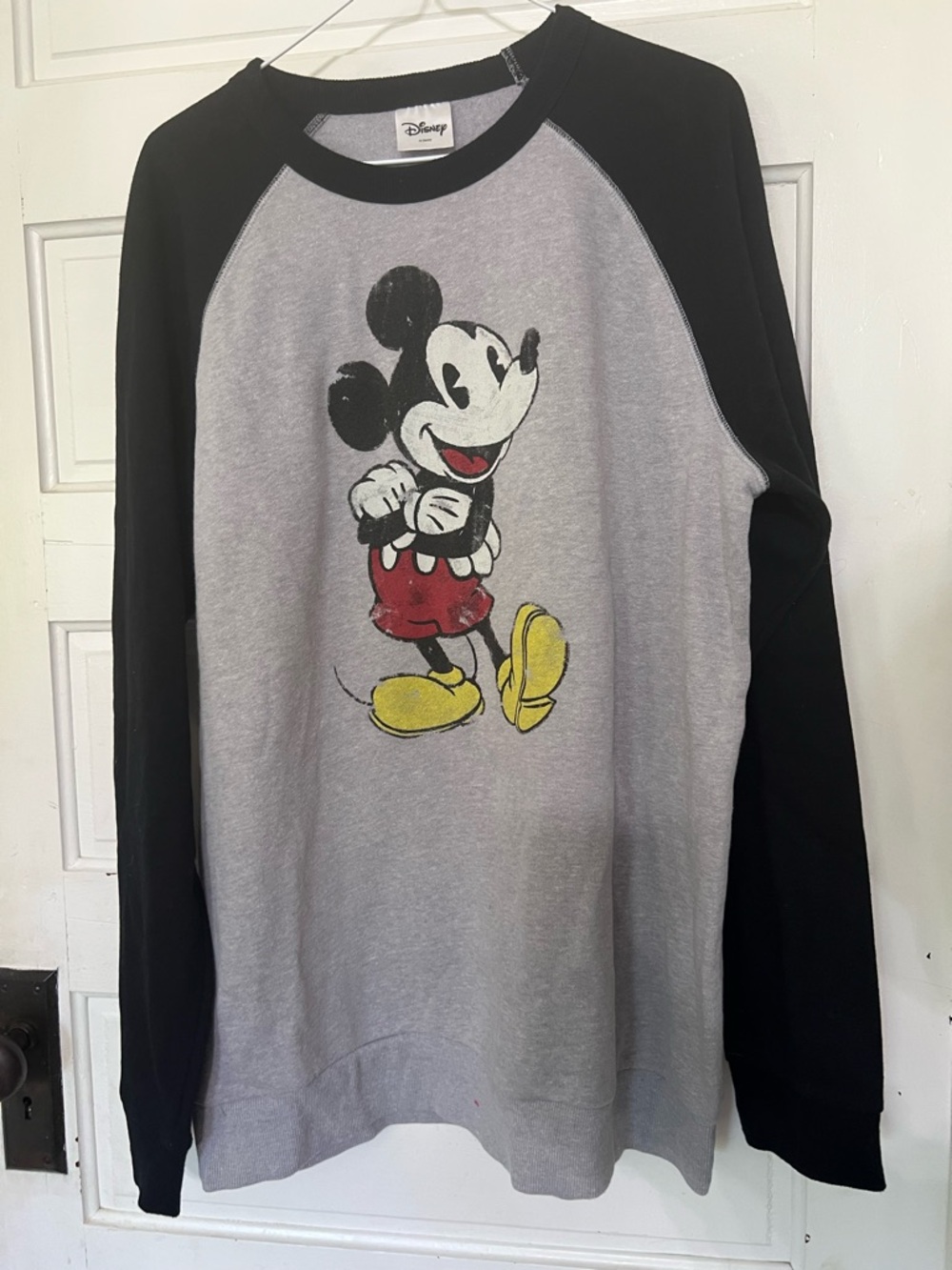 Gray Mickey Mouse sweatshirt with black sleeves